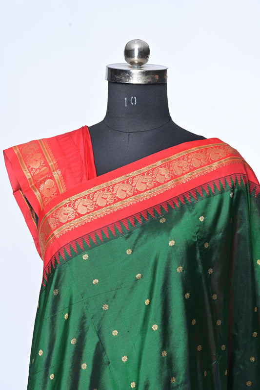 Silk red gadhval silk saree for weddings and festive occasions