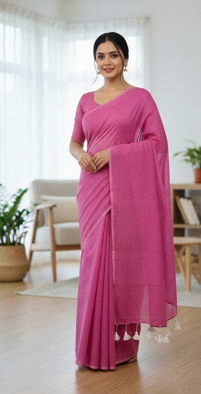 Simple pink cotton saree with minimal border and tassels