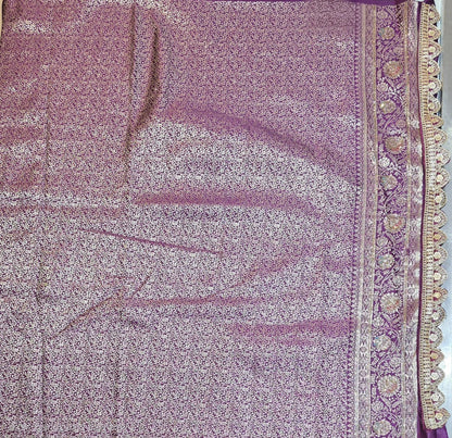 Wedding special Banarasi silk saree for women with traditional motifs
