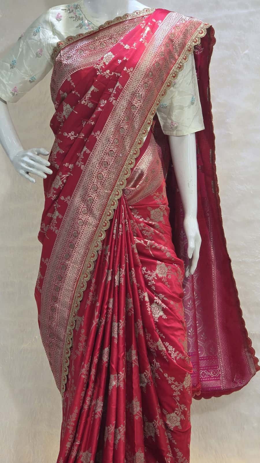 Classic red Banarasi silk saree with intricate silver zari work