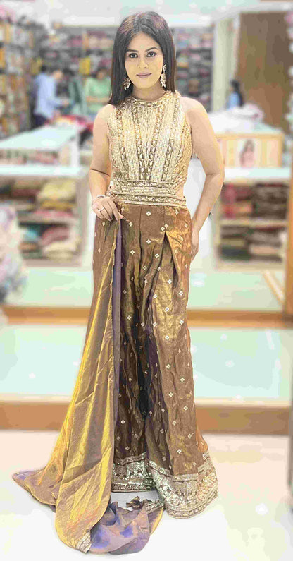 Close-up of antique bronze jumpsuit bodice featuring gold zardosi embroidery, sequins, and mirror-work detailing.