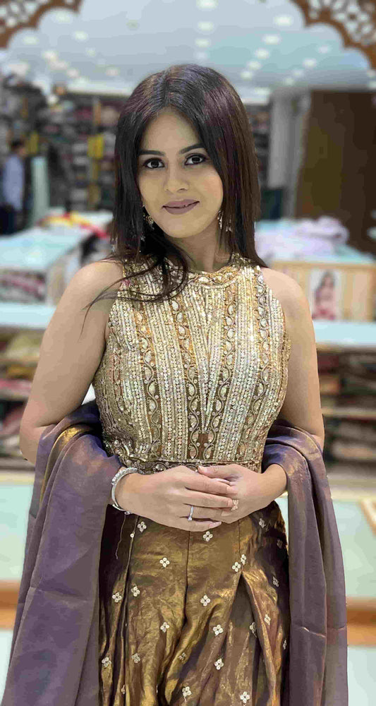 Antique bronze metallic Indo-Western jumpsuit with heavily embellished halter bodice and wide-leg pleated silhouette front view.