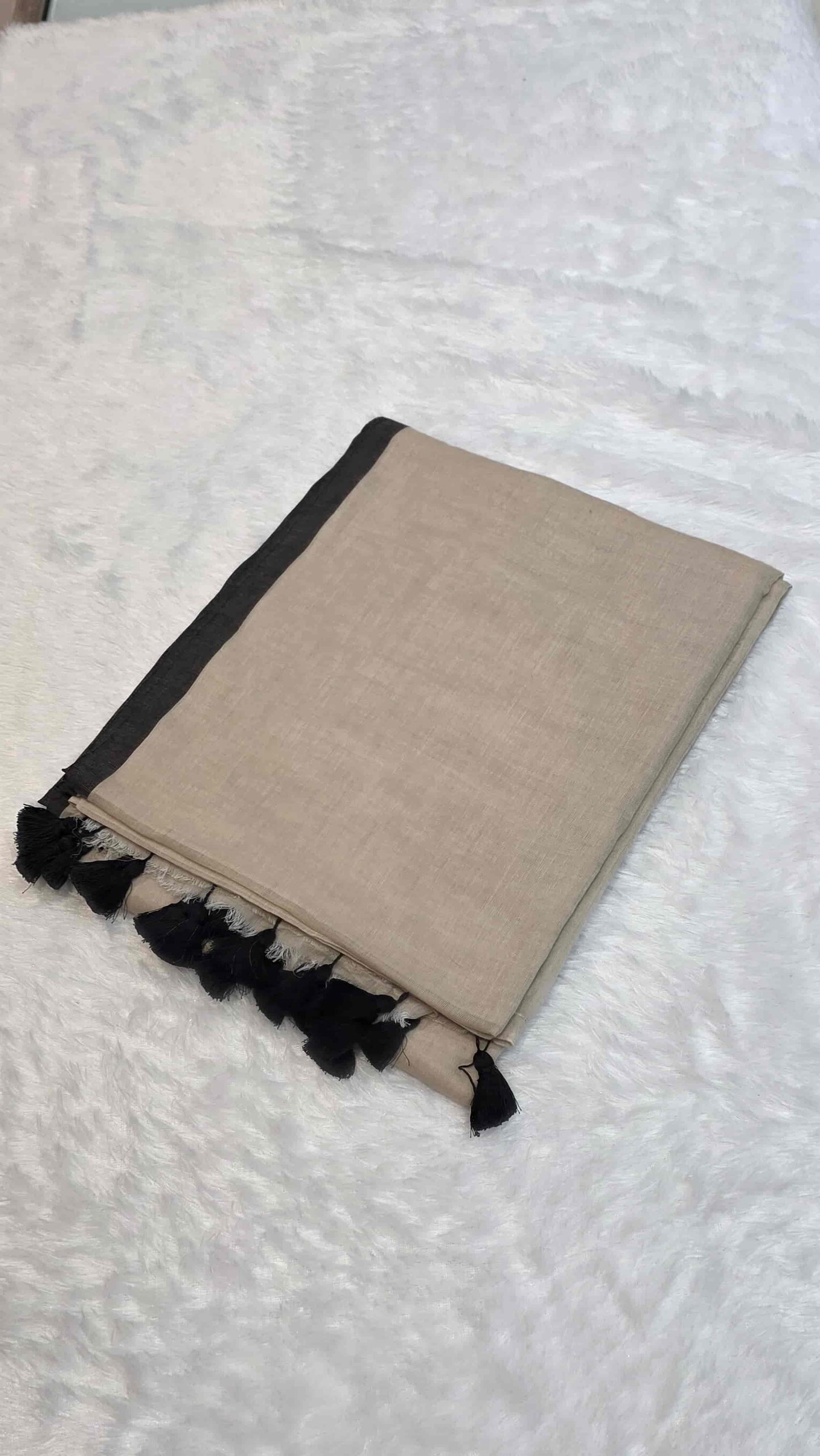 Soft mulmul cotton saree in beige with dark black border