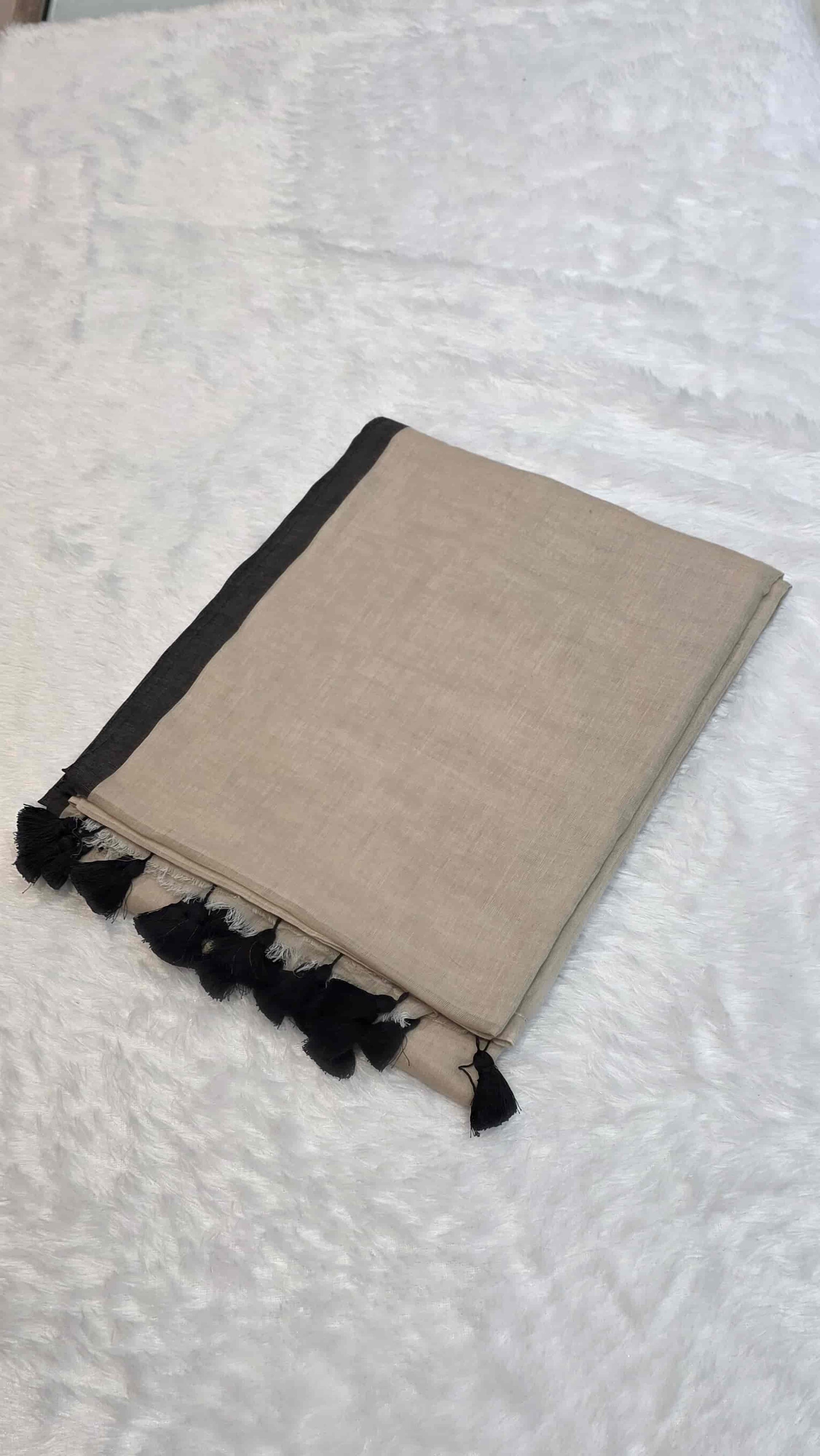 Soft mulmul cotton saree in beige with dark black border