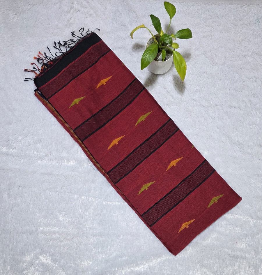 Black cotton saree with small triangle butti pattern, Ikat border weaving, contrast pallu styling and tassel detailing