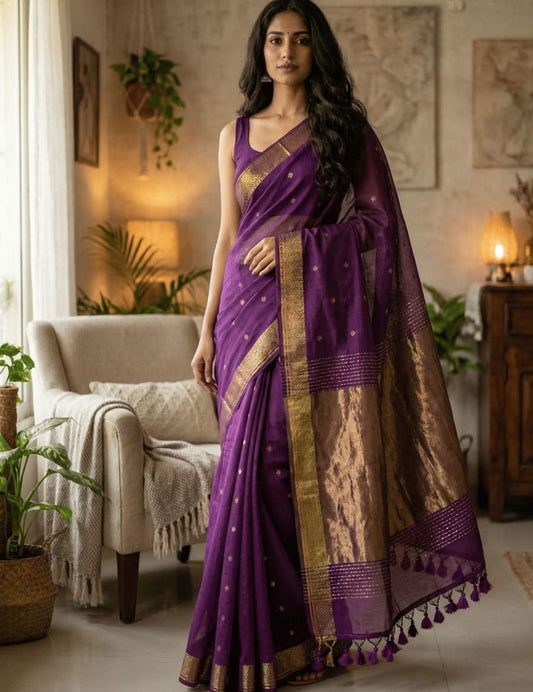 Festive cotton saree adorned with copper butti pattern, copper zari pallu, and classic golden border for traditional attire.