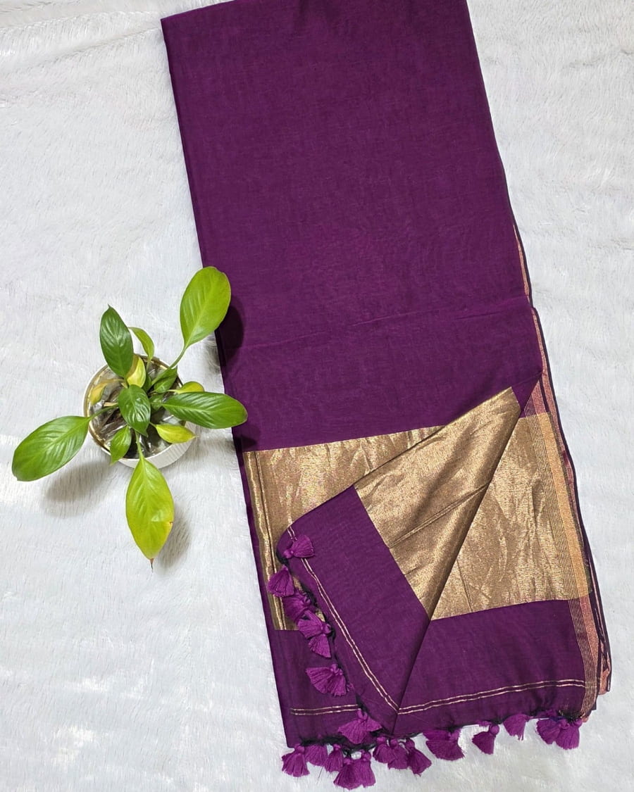 elegant cotton saree with a plain body, minimal golden border, and copper zari pallu. Soft, breathable, and lightweight—perfect for daily, office, and casual wear.
