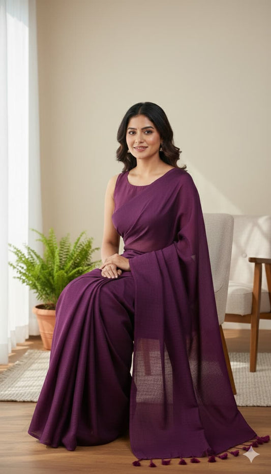 Plain dark magenta mulmul cotton saree with tassel pallu