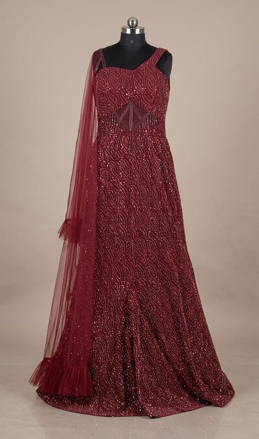 Designer red cocktail gown with all-over sequins and flared silhouette