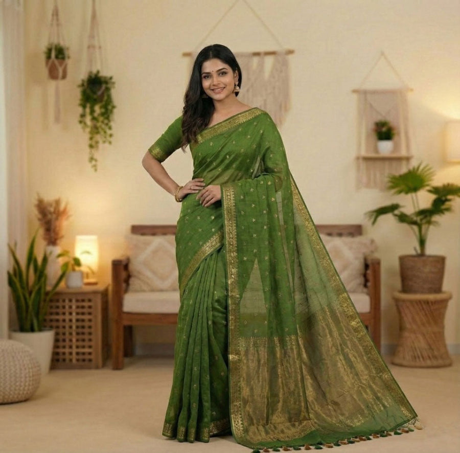 This is  apremium grass green cotton saree with elegant border and beautiful copper zari pallu ideal for daily wear, family functions.