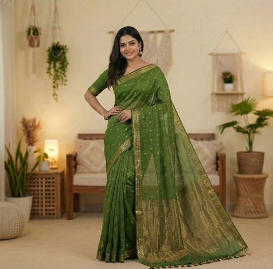 This is  apremium grass green cotton saree with elegant border and beautiful copper zari pallu ideal for daily wear, family functions.