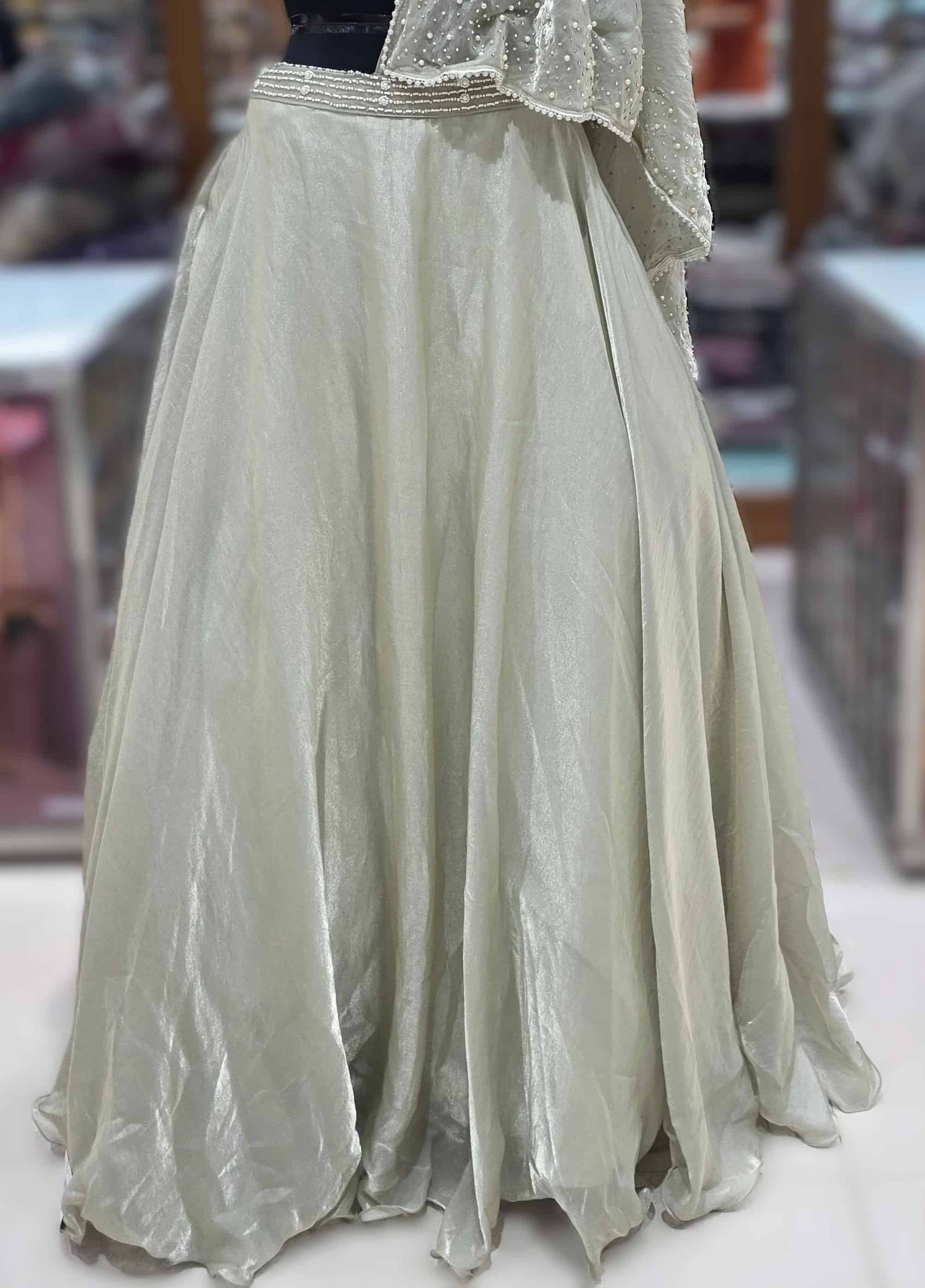 Soft net dupatta with pearl embellishments paired with Indo-Western lehenga