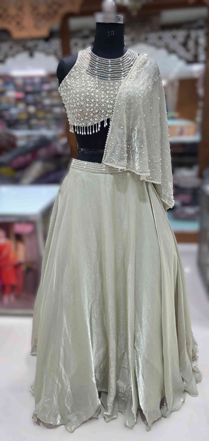 Flowy ivory organza lehenga skirt with soft shimmer finish Indo-Western style