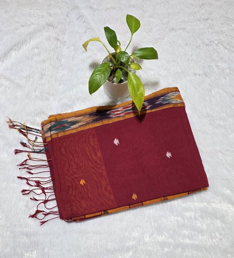 Maroon cotton saree with delicate triangle design, Ikat weave border and matching unstitched blouse piece