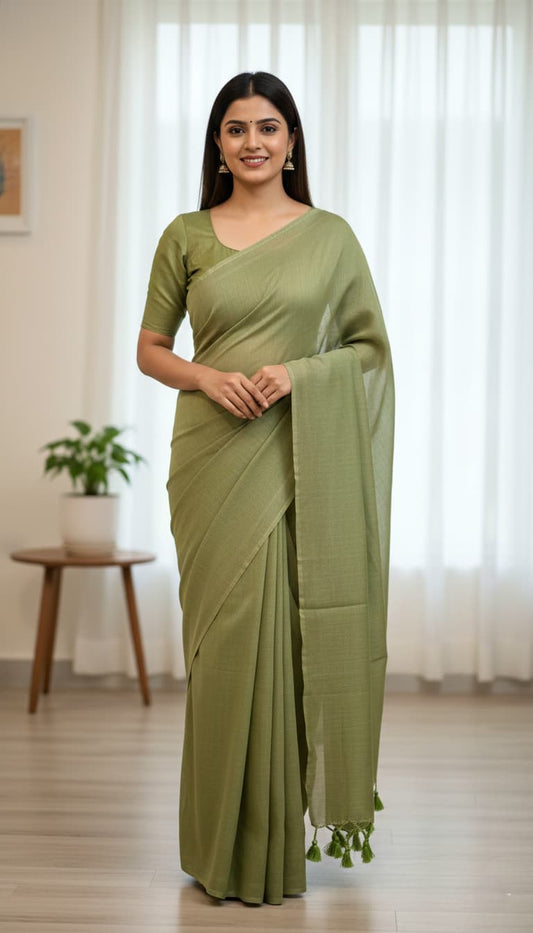 Olive green mulmul cotton saree with hand-tied tassels on pallu