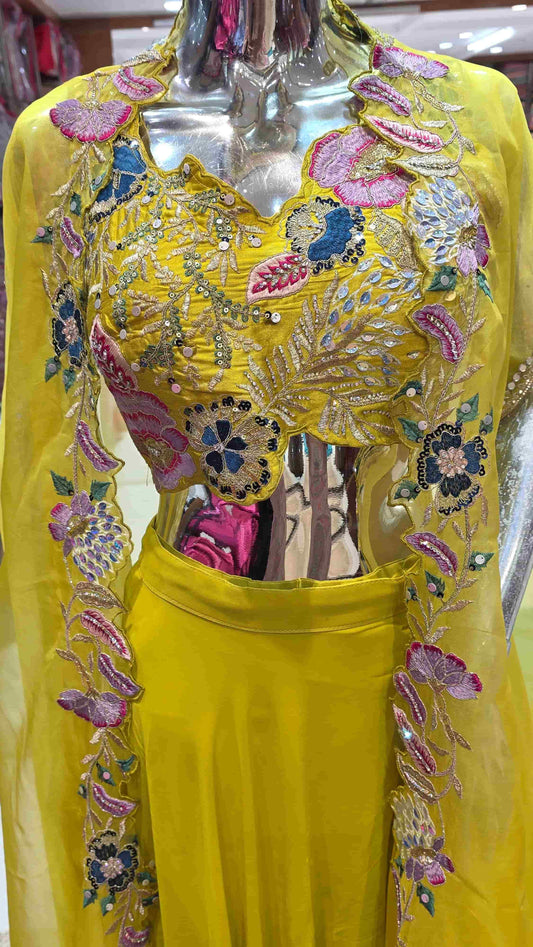 Designer mustard co-ord set featuring multicolour floral embroidery and flowy skirt