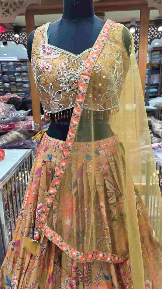 Mustard gold floral lehenga set with multicolour embroidery and printed skirt full view.
