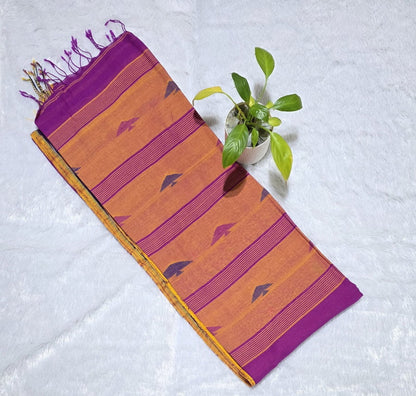 This is a beautiful magenta cloiour cotton saree with overall buties and elegant ikat border weaving paired with beautiful contrast pallu. Ideal for gatherings, daily wear , office wear, family functions and festivals.