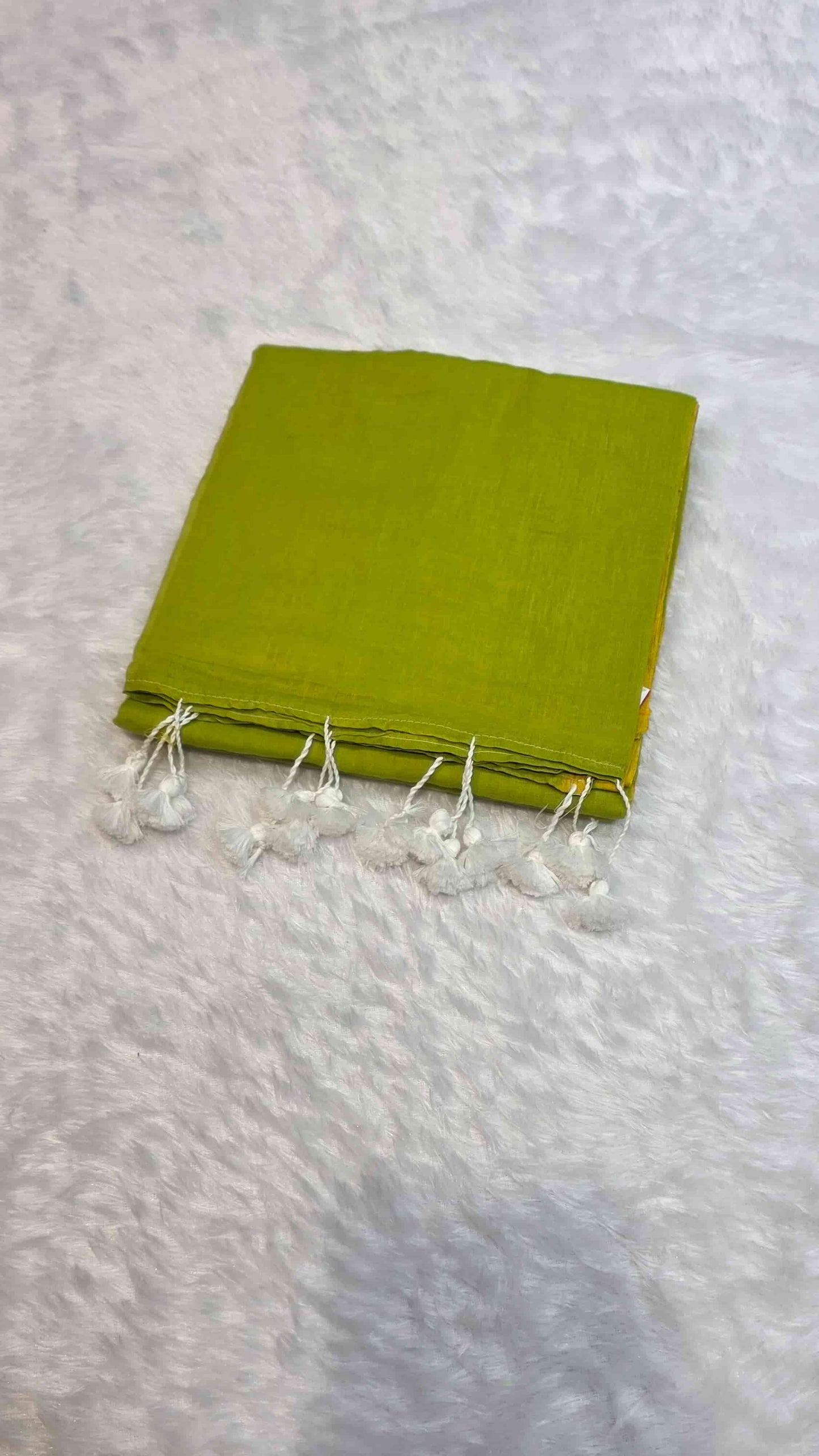 Soft mulmul cotton saree in olive green with mustard yellow border