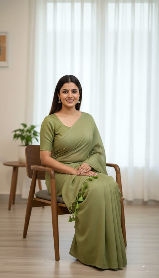 Soft mulmul cotton saree in olive green with tassel edge