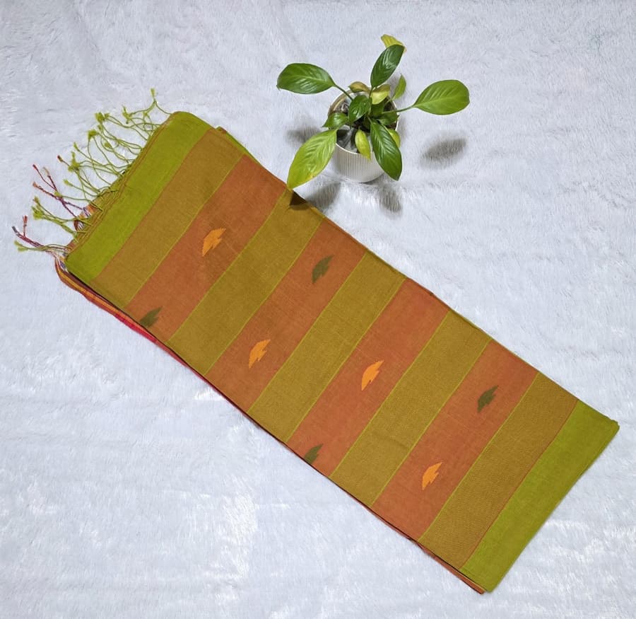Elegant parrot green cotton saree with triangle butties, Ikat border pattern, tassel pallu and unstitched blouse