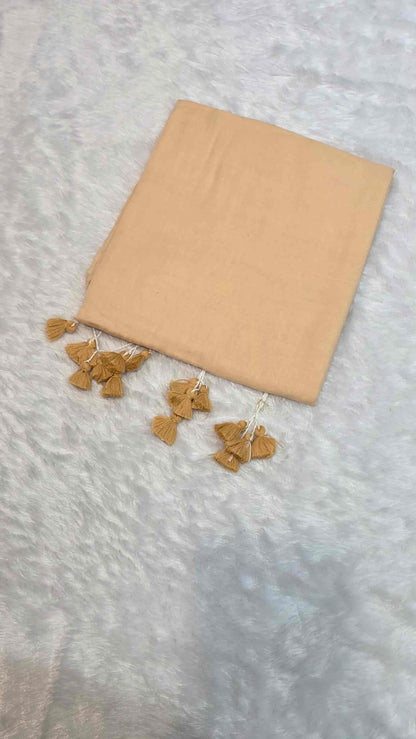 Lightweight cream mulmul cotton saree for day and evening wear