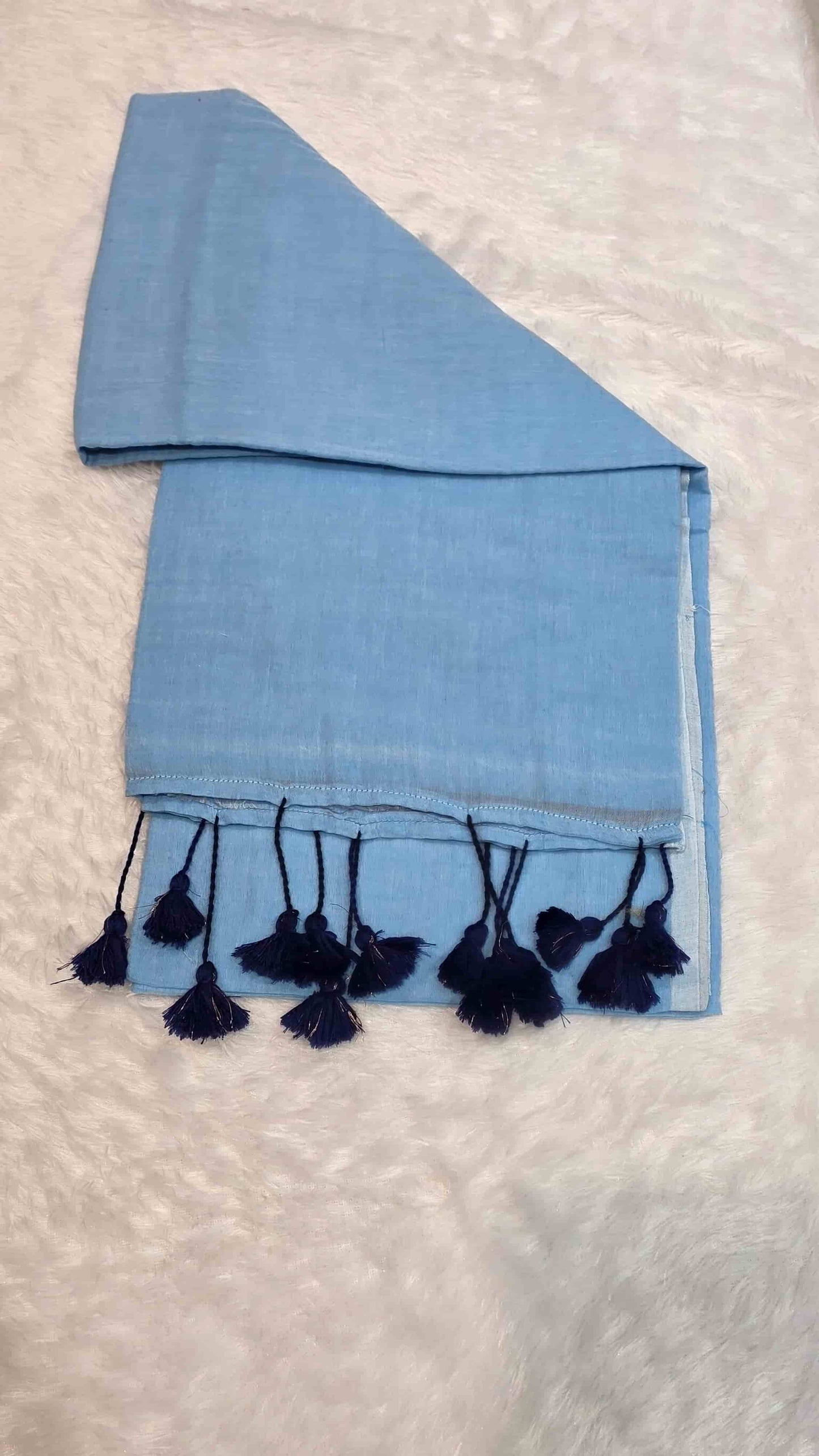 Soft mulmul cotton saree in light blue with handcrafted tassels
