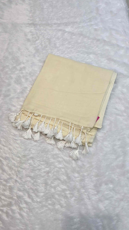 Soft mulmul cotton saree in off white with handcrafted white tassels