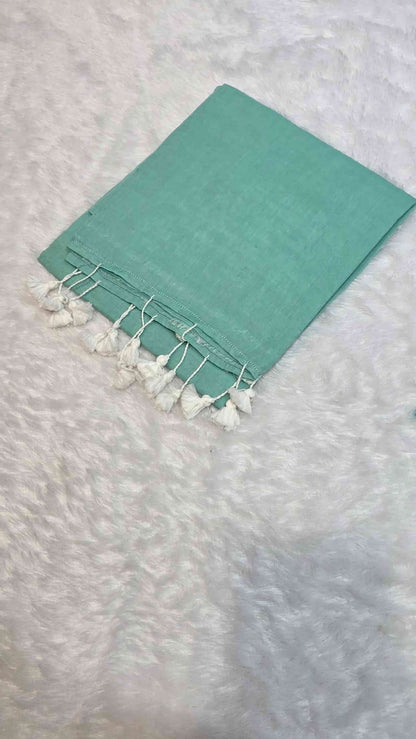 Elegant sea green mulmul cotton saree with hand-tied tassels