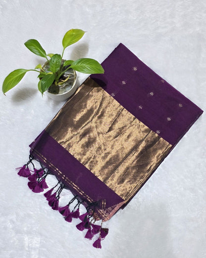Purple pure cotton saree with all over butties, copper zari pallu and simple golden border with tussels by Kabra the Fashionista