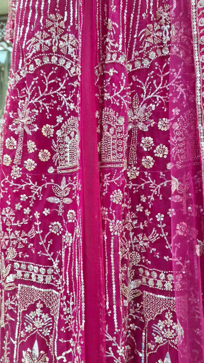 Full flare floor-length rani pink embroidered Anarkali gown