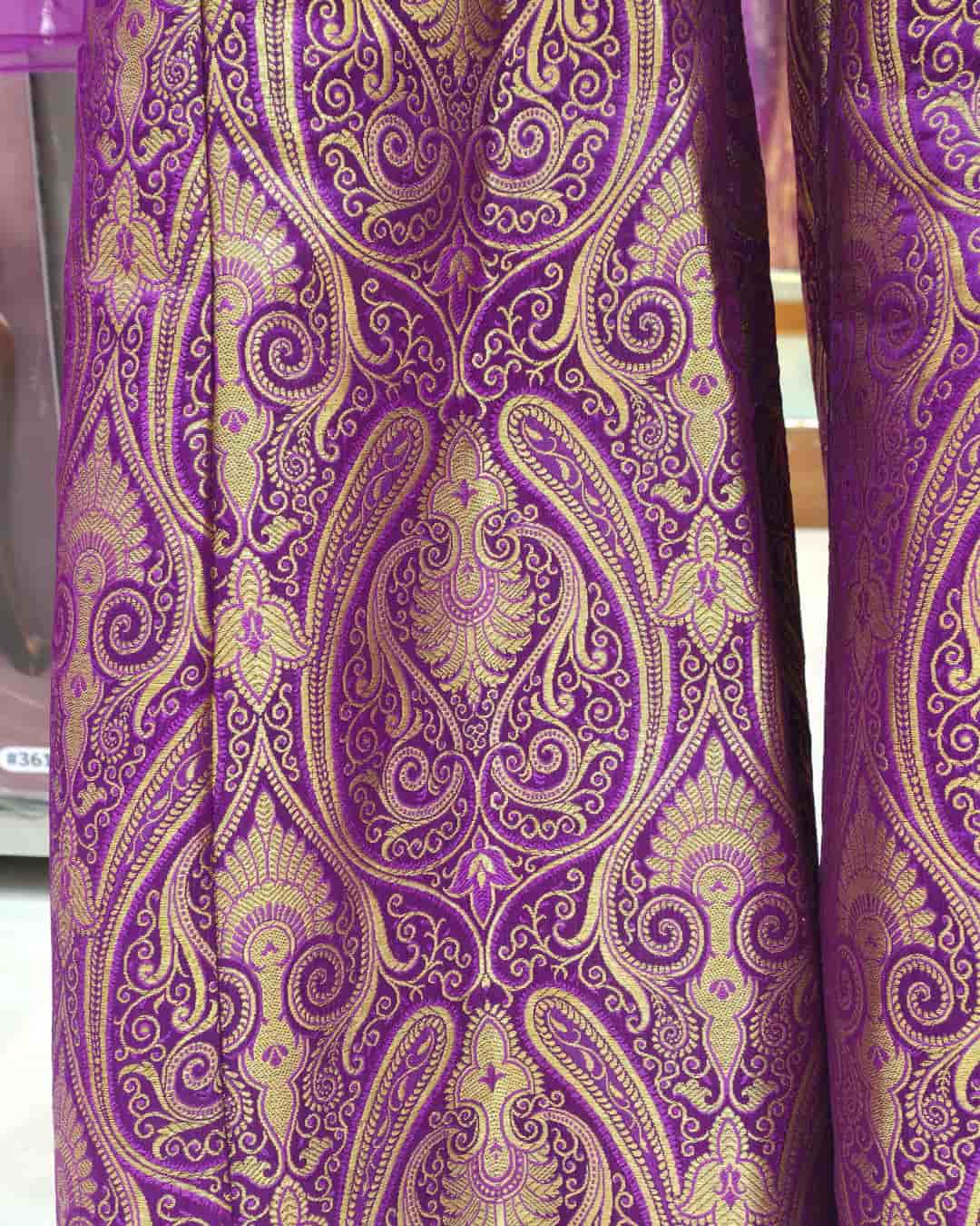 Royal purple Indo-Western gharara pants in Banarasi brocade with dramatic flare and gold zari woven pattern.