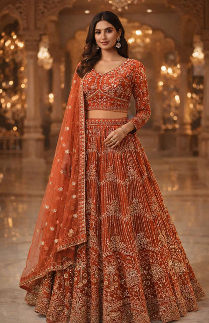 Rust orange embroidered lehenga set with sequin work and net dupatta full front view.