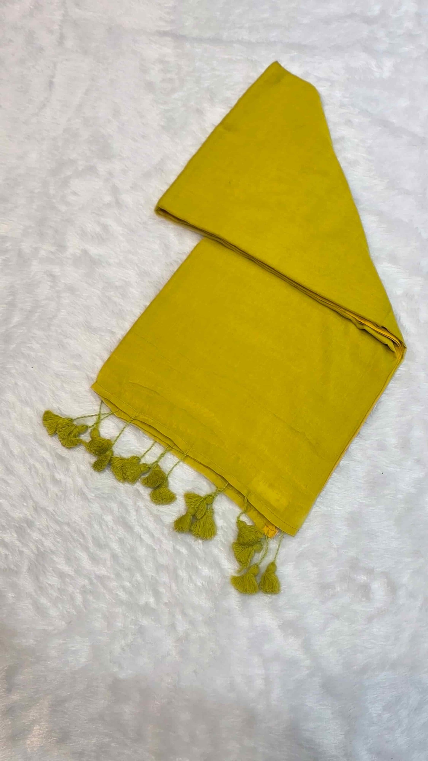 Elegant mustard yellow mulmul cotton saree with hand-tied tassels