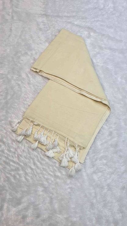 Elegant off white mulmul cotton saree with hand-tied white tassels