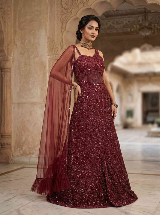 Designer red cocktail gown with all-over sequins and flared silhouette