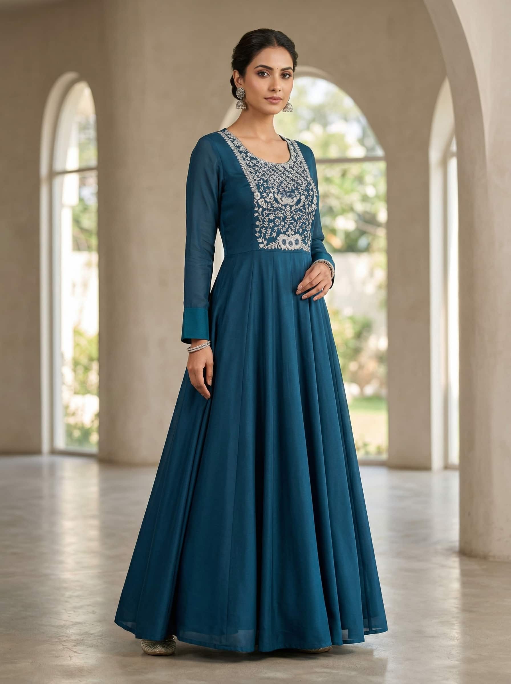 Navy blue Anarkali dress with embroidered yoke featuring intricate thread and sequin work in flowing georgette fabric