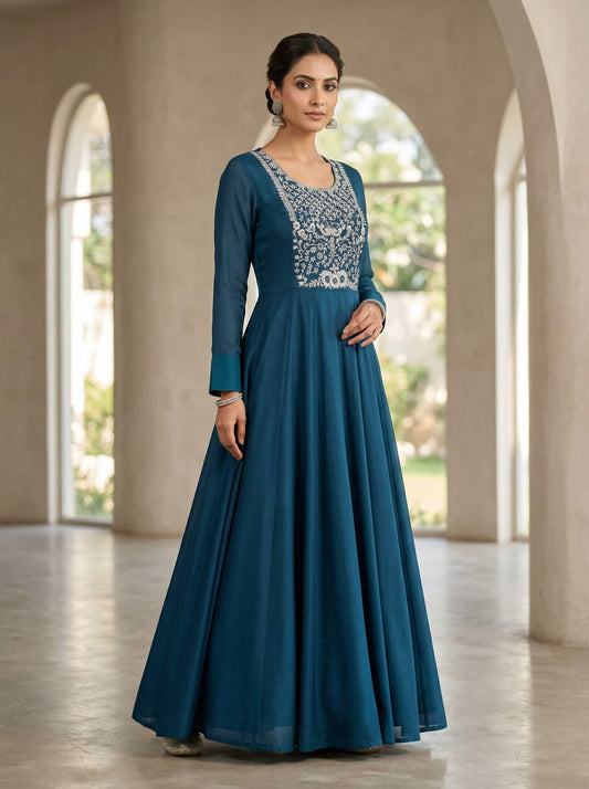 Navy blue Anarkali dress with embroidered yoke featuring intricate thread and sequin work in flowing georgette fabric